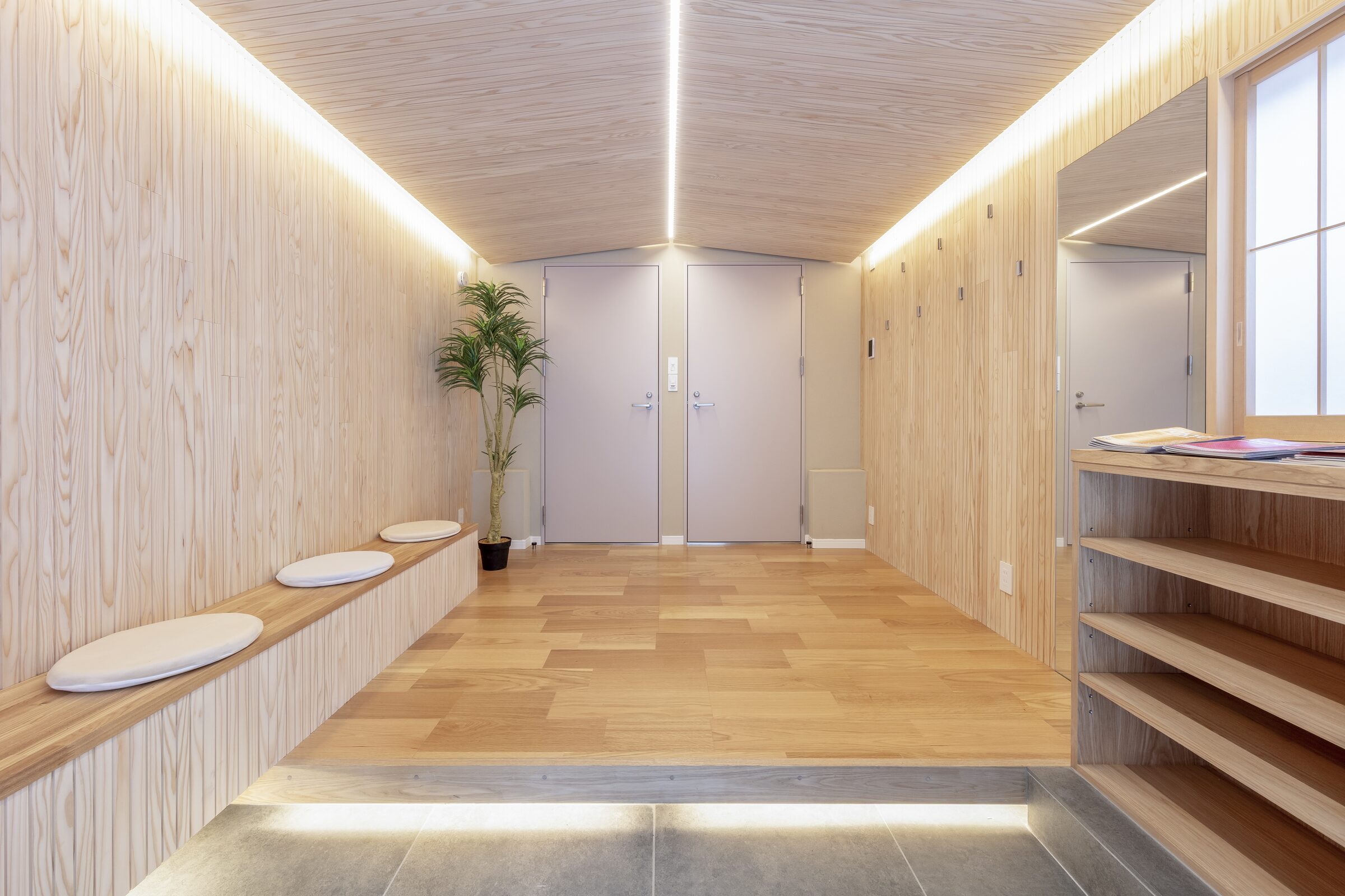333 Tokyo Base Tower — wood-clad entrance hallway